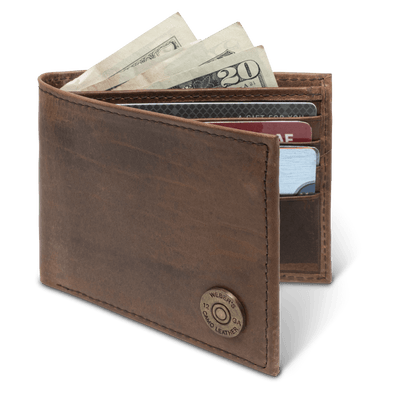 A classic piece, the Dynasty Bifold Shotshell Wallet provides a rich premier full grain leather and a hand-oiled stylish finish, topped off with a vintage shotshell concho. Ensure to get yours today! 8 Card Slots 3 Storage Pockets 2 ID Windows Leather Tipped Bill Compartment Weber’s Signature Shotshell Concho Dimensions: 4.37"L x 3.37"H RFID Protection Color: Brown