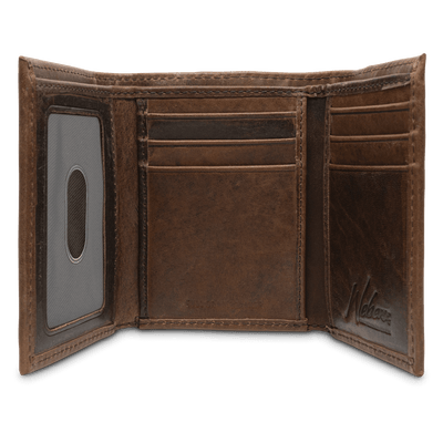 Our signature Dynasty Trifold Elk Wallet comes in premier full grain leather along with a hand-oiled stylish finish. A stunning piece to have in your collection! 6 Card Slots 2 Storage Pockets ID Window Leather Tipped Bill Compartment Weber’s Signature Elk Concho Dimensions: 3.37"L x 4"H RFID Protection Color: Brown