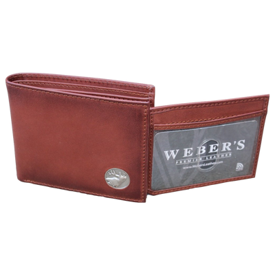The Wildlife Bifold Elk Wallet is created from hand-burnished, rich full grain leather, providing a beautiful aged patina. The elk concho provides a personalized touch...stylish and unique, this piece is a must-have for any collection! 8 Card Slots 3 Storage Pockets 2 ID Windows Leather Tipped Bill Divider Weber's Signature Elk Concho Dimensions: 4.5"L x 3.5"H RFID Protection Color: Caramel