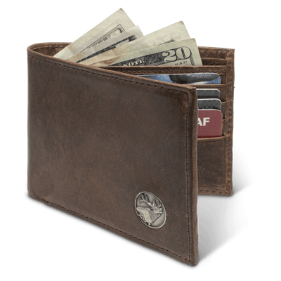The Dynasty Bifold Elk Wallet, crafted with premier full grain leather and a hand-oiled stylish finish, makes this piece perfect for any devoted sportsman. 8 Card Slots 3 Storage Pockets 2 ID Windows Leather Tipped Bill Compartment Weber’s Signature Elk Concho Dimensions: 4.37"L x 3.37"H RFID Protection Color: Brown