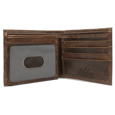 The Dynasty Bifold Elk Wallet, crafted with premier full grain leather and a hand-oiled stylish finish, makes this piece perfect for any devoted sportsman. 8 Card Slots 3 Storage Pockets 2 ID Windows Leather Tipped Bill Compartment Weber’s Signature Elk Concho Dimensions: 4.37"L x 3.37"H RFID Protection Color: Brown