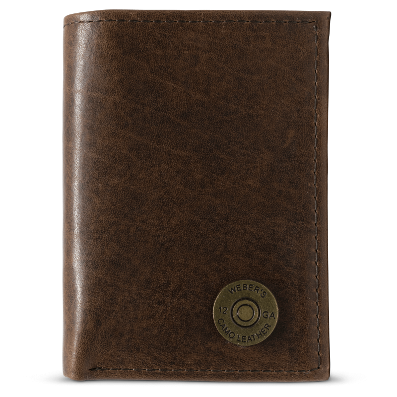 A classic for anyone's collection, the Dynasty Trifold Shotshell Wallet comes with a beautiful hand-oiled finish within a premier full grain leather. The signature shotshell concho makes it the perfect piece for any outdoor enthusiast. Don't miss out! 6 Card Slots 2 Storage Pockets 1 ID Window Leather Tipped Bill Compartment Dimensions: 3.37"L x 4"H RFID Protection Color: Brown