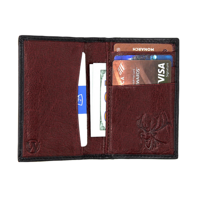 The Pursuit Front Pocket Duo-Fold Elk Wallet contains bold, hand-dyed, premier full grain leather, topped with a debossed elk found on the inner and outer corner of the wallet. Stunning piece for any collection. 4 Card Slots 2 Interior Pockets Exterior Easy Access Pocket Slim Minimalist & Modern Design Dimensions: 4.3"L x 3"H RFID Protection Color: Black | Crimson
