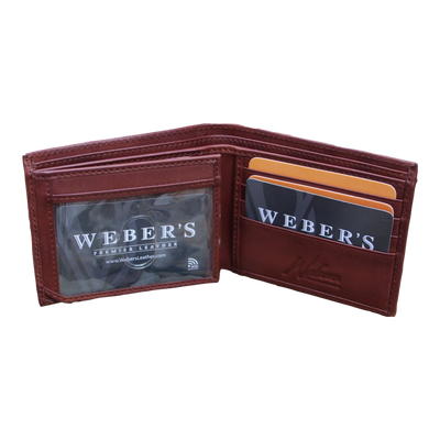 Elegance at its best, our Wildlife Bifold Bass Wallet provides a hand-burnished finish, rich full grain leather, and our signature bass concho.&nbsp; A classic piece to bring to the table, don't miss out! 8 Card Slots 3 Storage Pockets 2 ID Windows Leather Tipped Bill&nbsp;Compartment Dimensions: 4.5"L x 3.5"H RFID Protection Color: Caramel