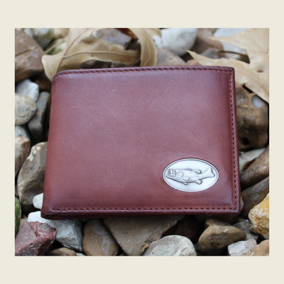 Elegance at its best, our Wildlife Bifold Bass Wallet provides a hand-burnished finish, rich full grain leather, and our signature bass concho.&nbsp; A classic piece to bring to the table, don't miss out! 8 Card Slots 3 Storage Pockets 2 ID Windows Leather Tipped Bill&nbsp;Compartment Dimensions: 4.5"L x 3.5"H RFID Protection Color: Caramel