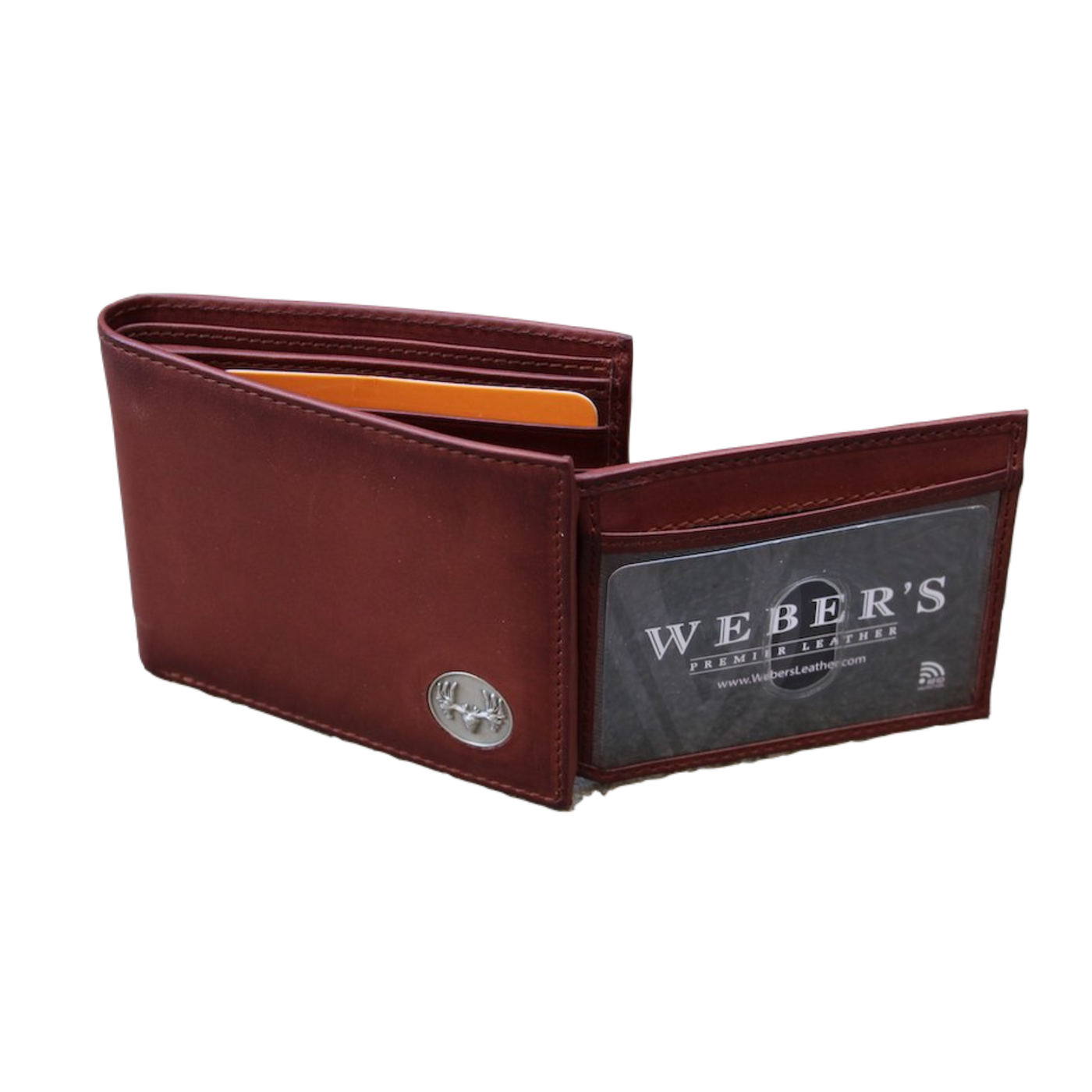 What hunter wouldn't enjoy the Wildlife Bifold European Mount Wallet for their collection? This piece is classic in style with its hand-burnished, rich full grain leather and the European mount concho. Ensure to get yours today! 8 Card Slots 3 Storage Pockets 2 ID Windows Leather Tipped Bill Compartment Dimensions: 4.5"L x 3.5"H RFID Protection Color: Caramel