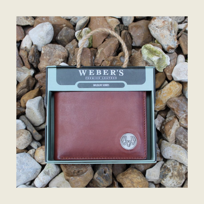 What hunter wouldn't enjoy the Wildlife Bifold European Mount Wallet for their collection? This piece is classic in style with its hand-burnished, rich full grain leather and the European mount concho. Ensure to get yours today! 8 Card Slots 3 Storage Pockets 2 ID Windows Leather Tipped Bill Compartment Dimensions: 4.5"L x 3.5"H RFID Protection Color: Caramel